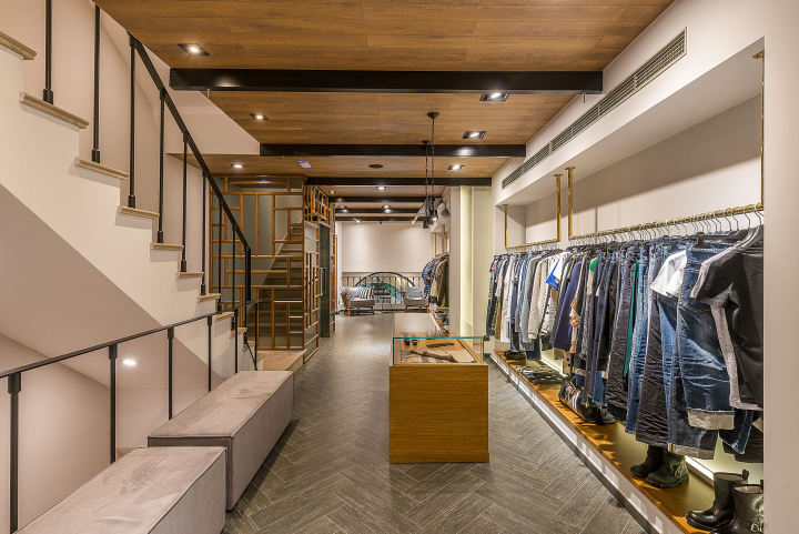 Смелый дизайн магазина модной одежды imatio в стиле промышленного ар-деко